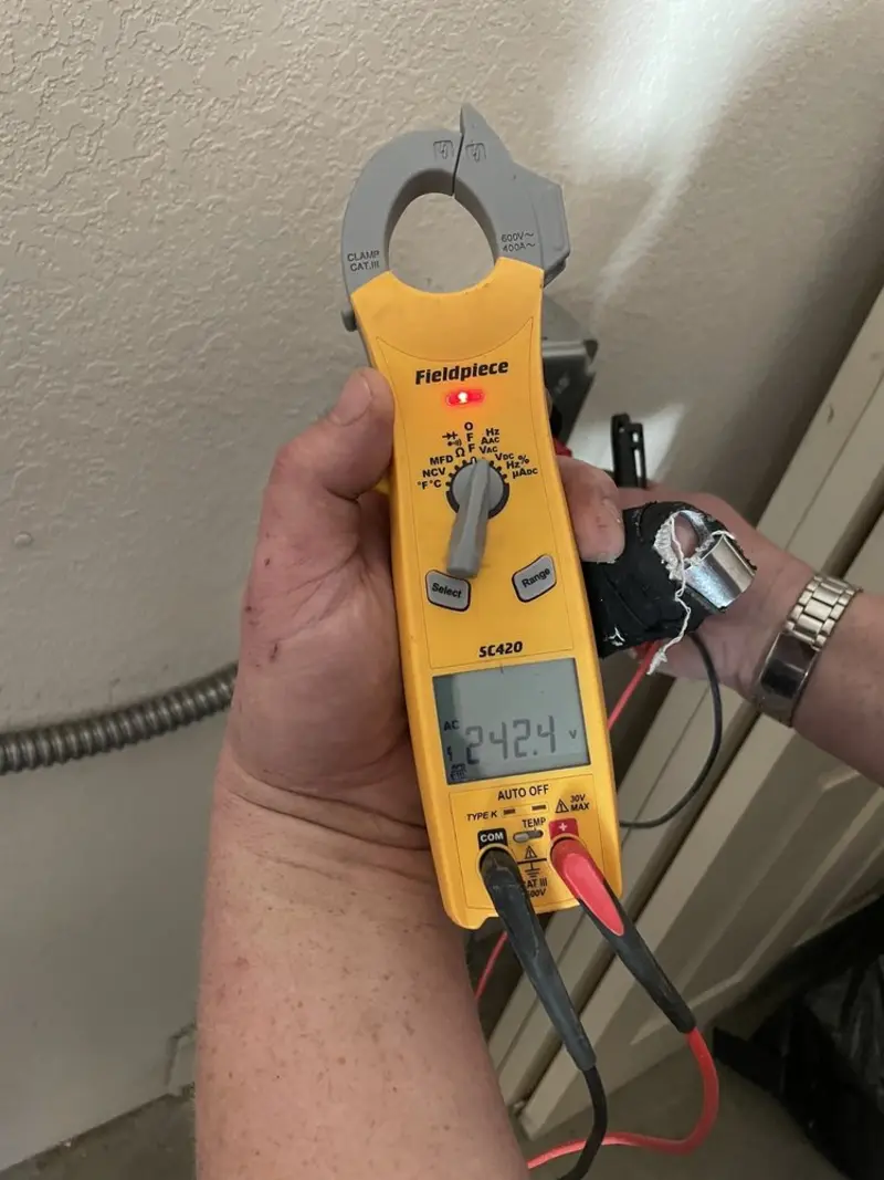 Voltage testing with clamp meter during Whole House Surge Protector in Hopewell